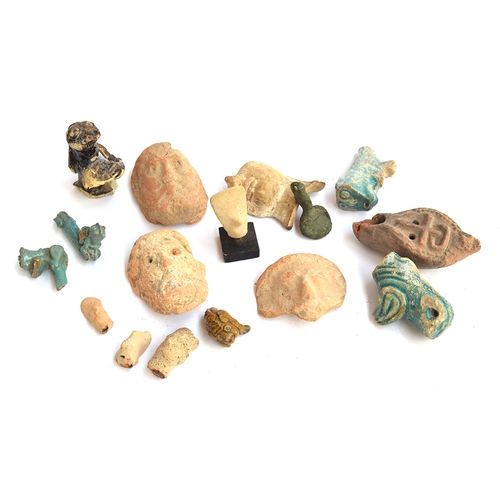 170 - A miscellaneous group of Classical antiquities
Circa 1st Millennium B.C. - Roman Period
Including fo... 