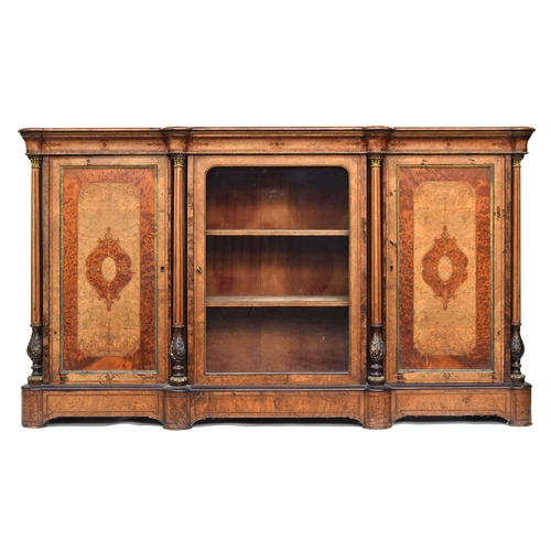 631 - A Victorian walnut and marquetry break front credenza, the central glazed cupboard flanked by panell... 