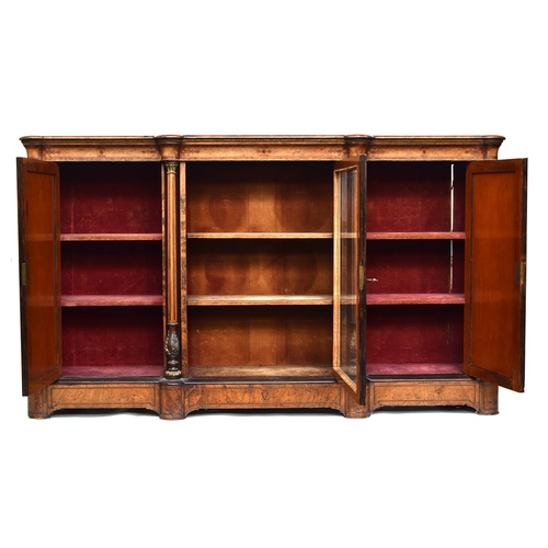 631 - A Victorian walnut and marquetry break front credenza, the central glazed cupboard flanked by panell... 