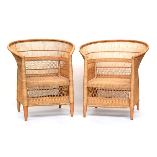 642 - A pair of wicker armchairs, approximately 57cm wide