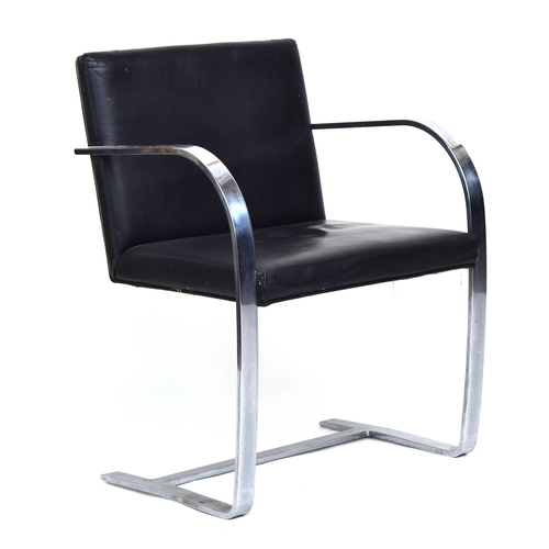 643 - A leather and chrome chair by Eero Saarinen