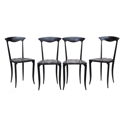 645 - A set of four contemporary leather dining chairs by Eero Saarinen for Knoll