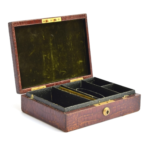 175 - A crocodile jewellery box by JC Vickery, Regent Street, with green fitted interior and Bramah lock, ... 