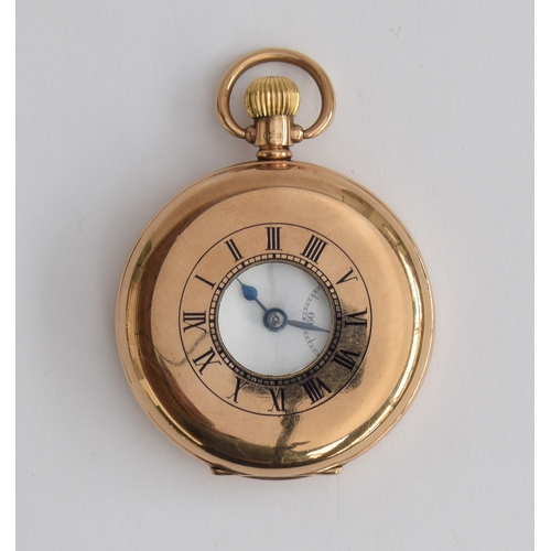 31 - A Swiss made 9ct gold half hunter pocket watch, the white enamel dial marked Federal, with Roman num... 