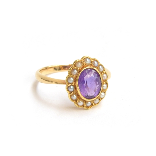 3 - An 18ct gold seed pearl and amethyst ring, gross weight 3.8g, size M