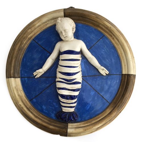 209 - An Italian pottery wall plaque after Andrea Della Robia depicting a swaddled infant, based on the or... 