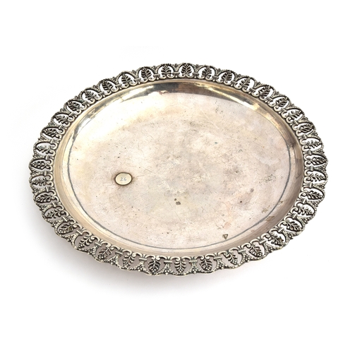 92 - An Egyptian silver salver, marked for 1936/7, the pierced edge decorated with palms and fronds, 34.5... 