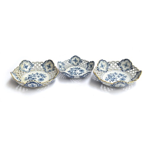 212 - Three Meissen blue and white 'Blumen' pattern baskets with pierced lattice borders, the two larger 2... 