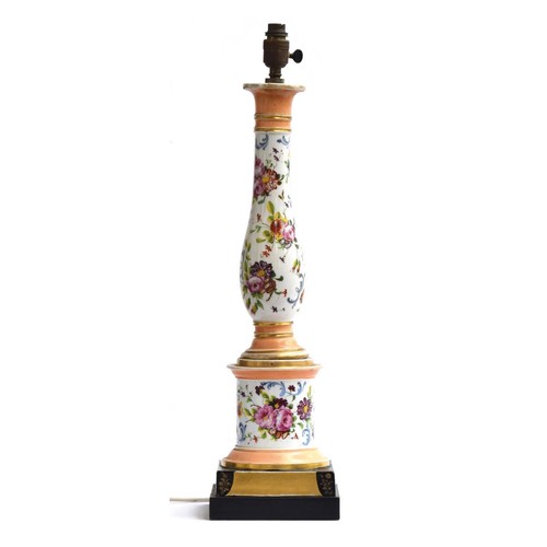 214 - A large 19th century ceramic lamp with hand painted floral decoration, heightened in gilt, approx. 5... 