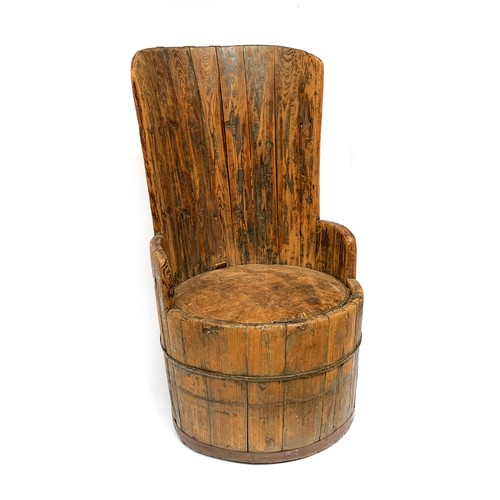 619A - A staved barrel shape armchair with studded leather drop in seat