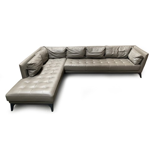 652 - A very large Roche Bobois grey leather corner sofa, 317cm long, running 220cm outwards, each section... 