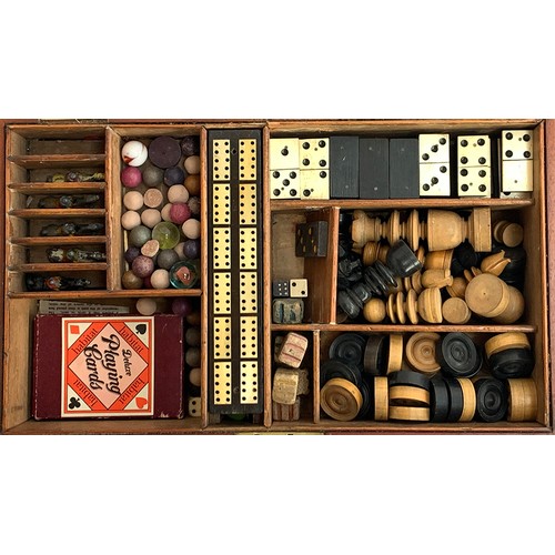 30 - A 19th century mahogany cased compendium of games to include chess and backgammon boards and pieces;... 