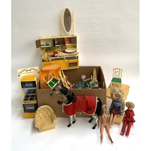 215 - A mixed box of Sindy to include various dolls and furniture