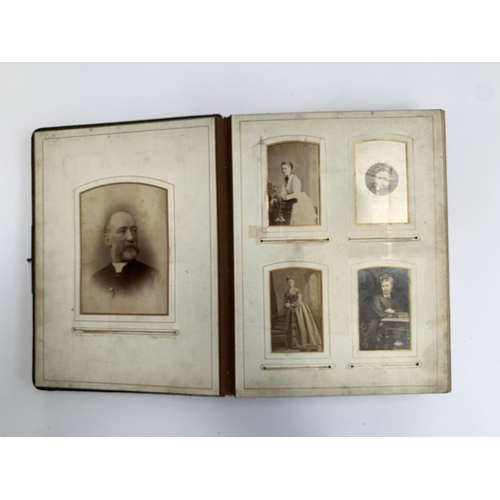 229 - A late Victorian photograph album, containing approx. 110 photos