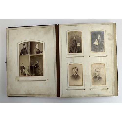 229 - A late Victorian photograph album, containing approx. 110 photos