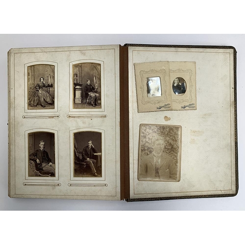 229 - A late Victorian photograph album, containing approx. 110 photos