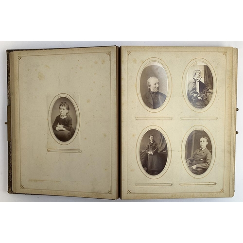 230 - A Victorian photo album containing a quantity of black and white photos, approx. 60 photos