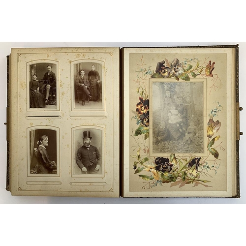 230 - A Victorian photo album containing a quantity of black and white photos, approx. 60 photos