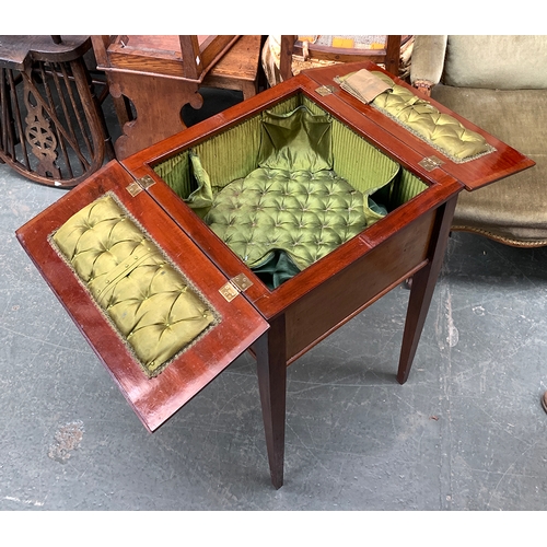 453 - A mahogany sewing box, hinged lid revealing a green silk upholstered fitted interior, on square tape... 