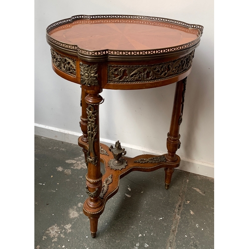 429 - An ormolu mounted continental centre table, parquetry top with pierced metal gallery, on three turne... 