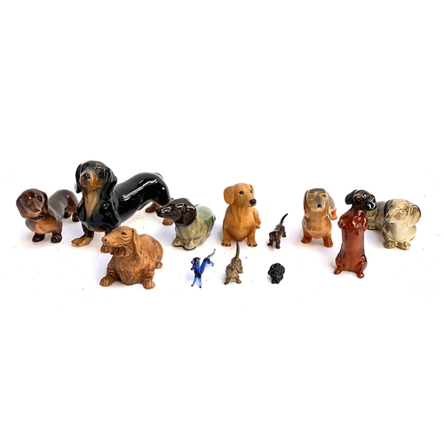 142 - A small collection of various dachshund figurines