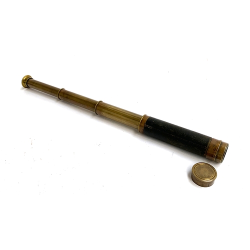 144 - A brass and leather three draw telescope, extended length 41cm