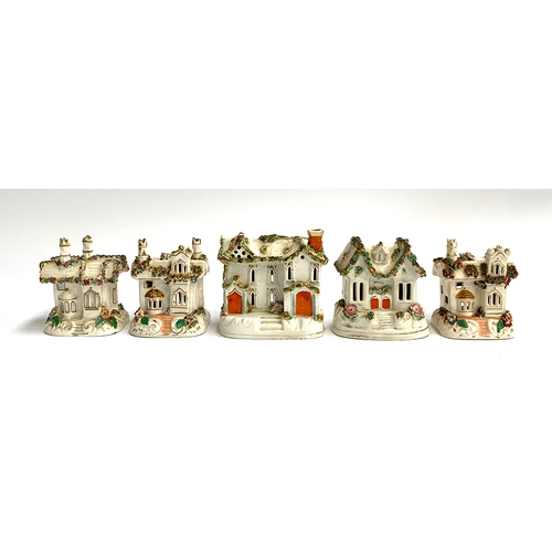 61 - A collection of five Staffordshire encrusted pastille burner cottages, the largest 13cmH (5)