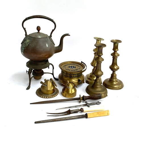 167 - A copper kettle on stand with burner; three brass candle sticks; trench art; further brass burner et... 