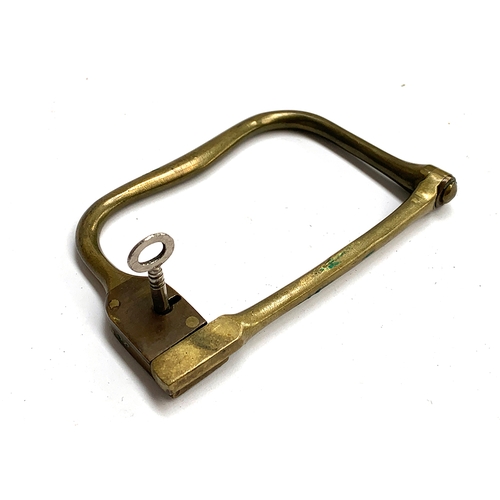 181 - An unusual Austrian brass padlock, with key, 11.5cmL