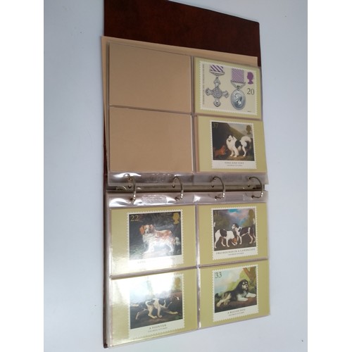 231A - An album containing a quantity of 1980s postcards relating to the Royal Family