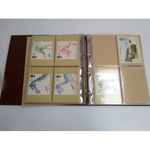 231A - An album containing a quantity of 1980s postcards relating to the Royal Family