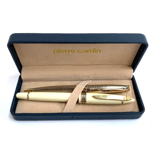 160A - A Pierre Cardin ballpoint pen, cased; together with a Laguiole ballpoint pen