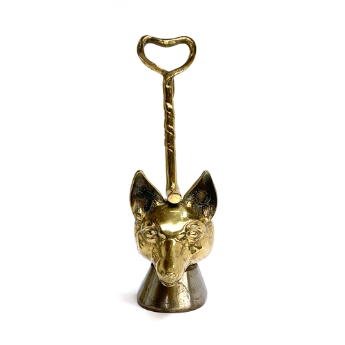 103 - A 19th century brass and iron fox mask doorstop, with twist design handles on horse hoof bases, 36cm... 