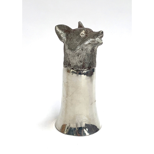 85 - A white metal fox mask stirrup cup, 15cm high