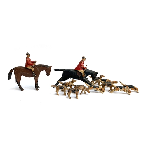 111 - A carved and painted wood fox hunting group attributed to Frank Whittington, of Forest Toys, compris... 