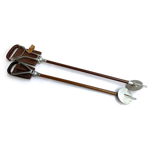 210 - Two shooting sticks, on 'The Perfect'; and one other (2)