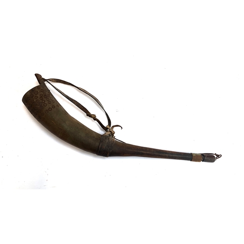 114 - A carved powder horn, 55cm long