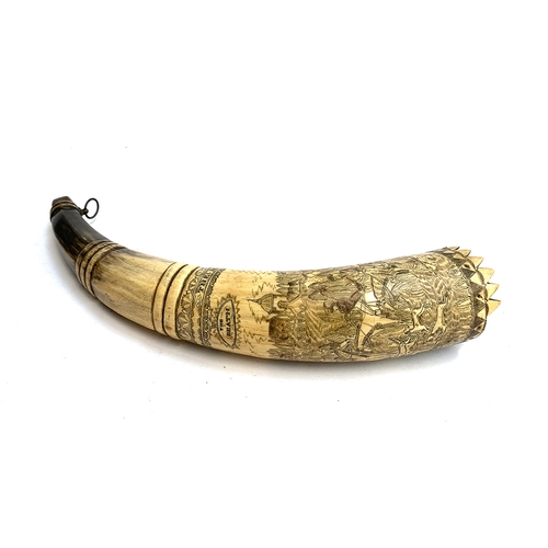 303 - A 19th century carved cow horn, inscribed 'The British Sportsman, The Leather', depicting huntsman a... 