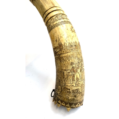303 - A 19th century carved cow horn, inscribed 'The British Sportsman, The Leather', depicting huntsman a... 