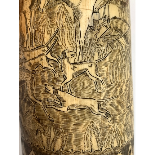 303 - A 19th century carved cow horn, inscribed 'The British Sportsman, The Leather', depicting huntsman a... 