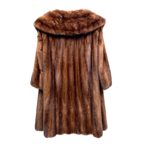 887 - A mink fur coat retailed by Calman Links, London, with shawl collar