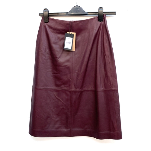 894 - A size 8 burgundy Jaeger leather skirt with back pocket