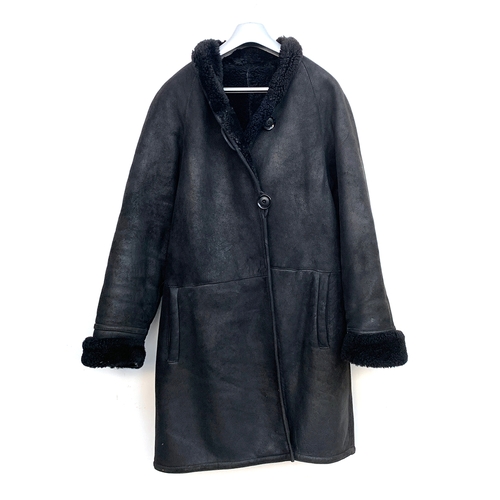 895 - A Mani black sheepskin coat, size 40