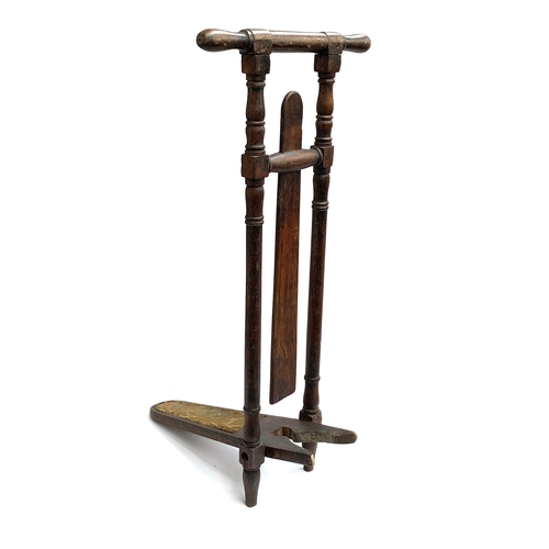 80 - An oak Edwardian boot pull, 90cm high