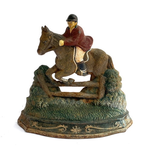 101 - A painted cast iron doorstop depicting a huntsman, 33cm high