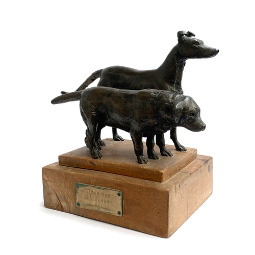 118 - A resin sculpture of a labrador and a lurcher, 27cm high