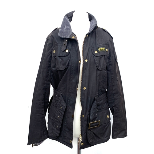 915 - A ladies Barbour black waxed cotton jacket, approx. size 12; together with a Barbour red canvas and ... 