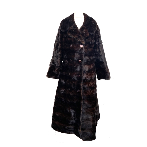 917 - A mink fur coat, size 10, with additional attachment for length