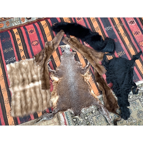 222 - Taxidermy interest; a number of skins and furs