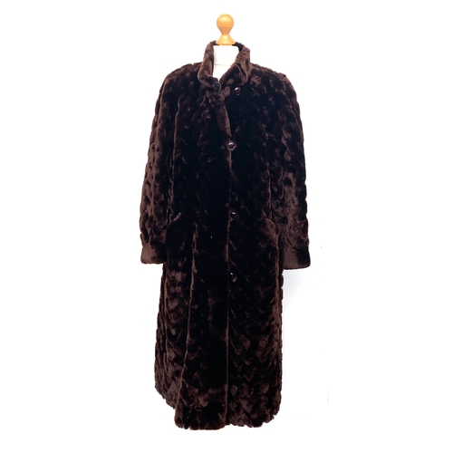 918 - A long brown fur coat, quilted